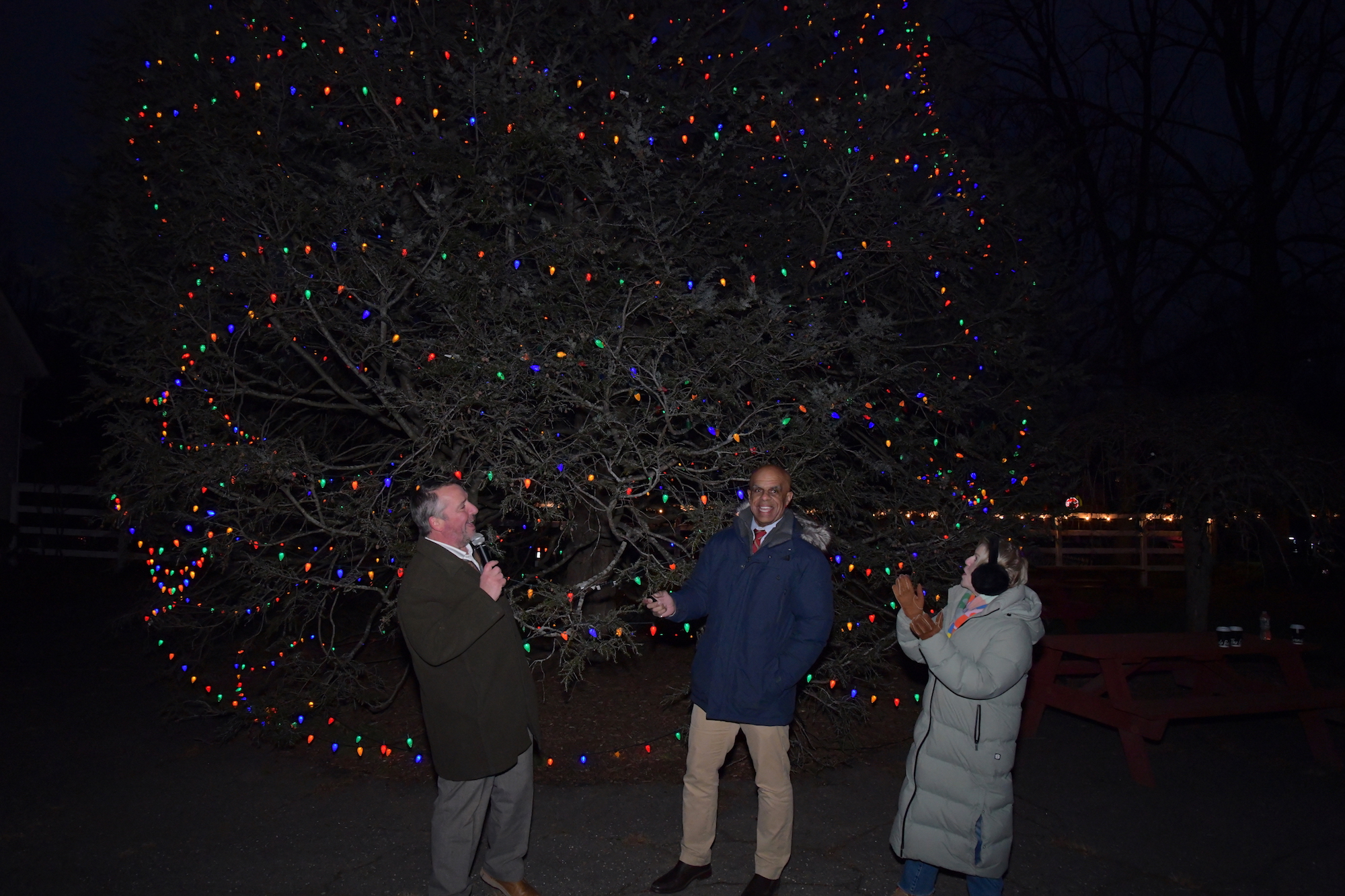 Tree–lighting event co-chairs Bill Constantino and Liz Milwe with First Selectman Kevin Christie