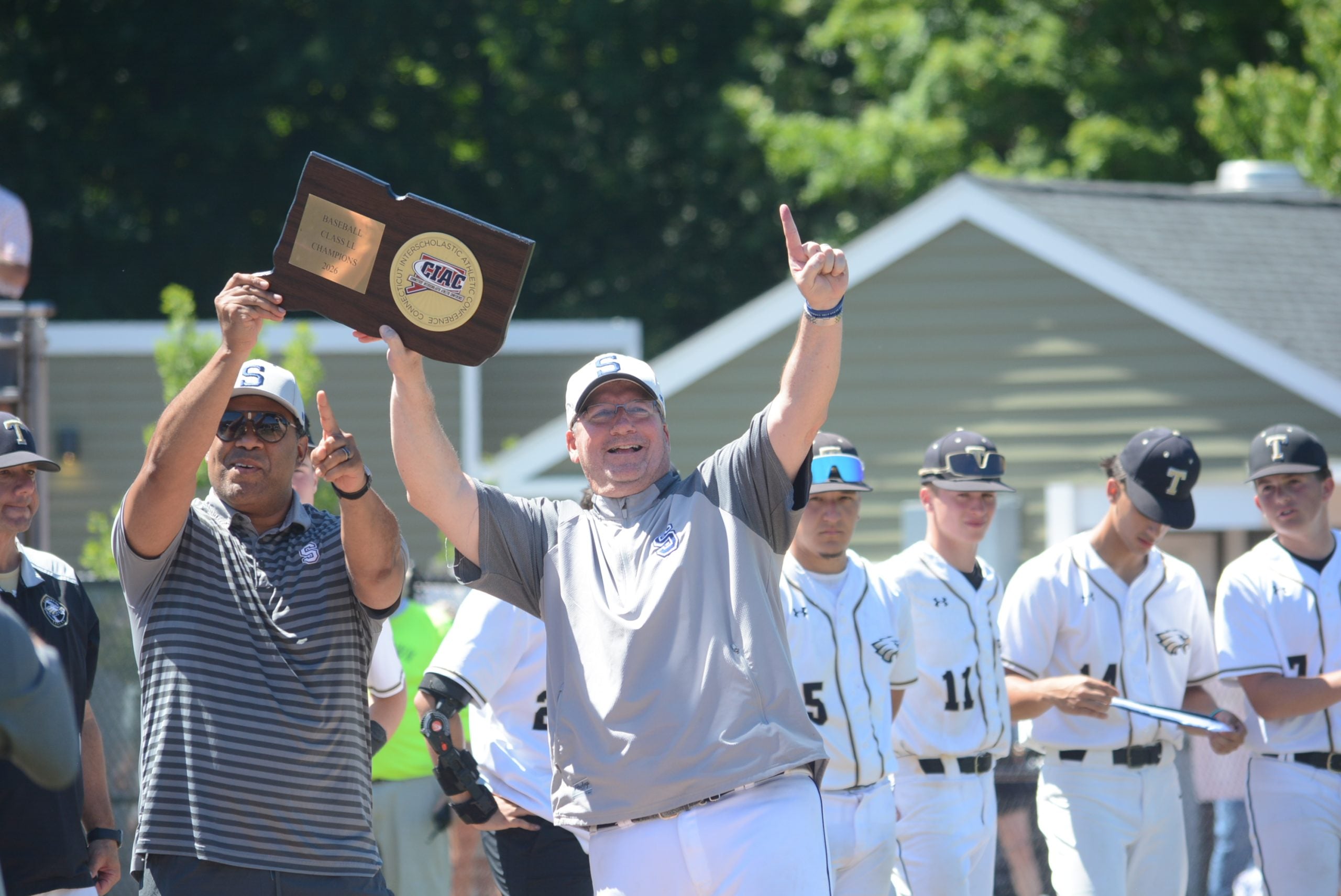 Principal Thomas Stafford, Coach Jack McFarland