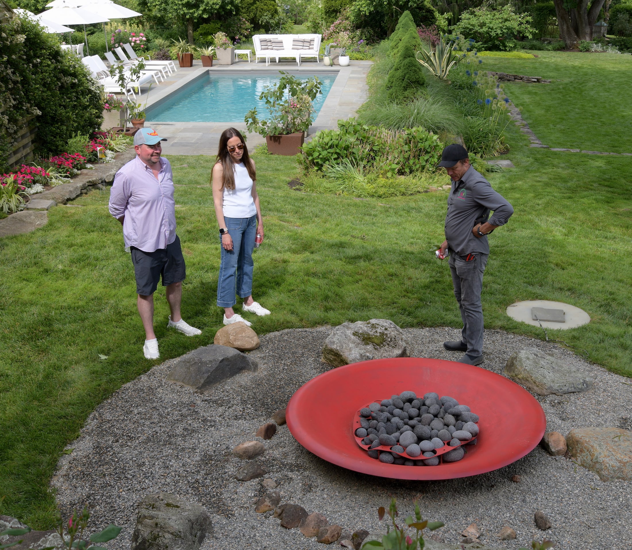 This is both a fire pit and an art installation - red enamel over steel. Paul Sztremer owns Wildflower Grounds Management