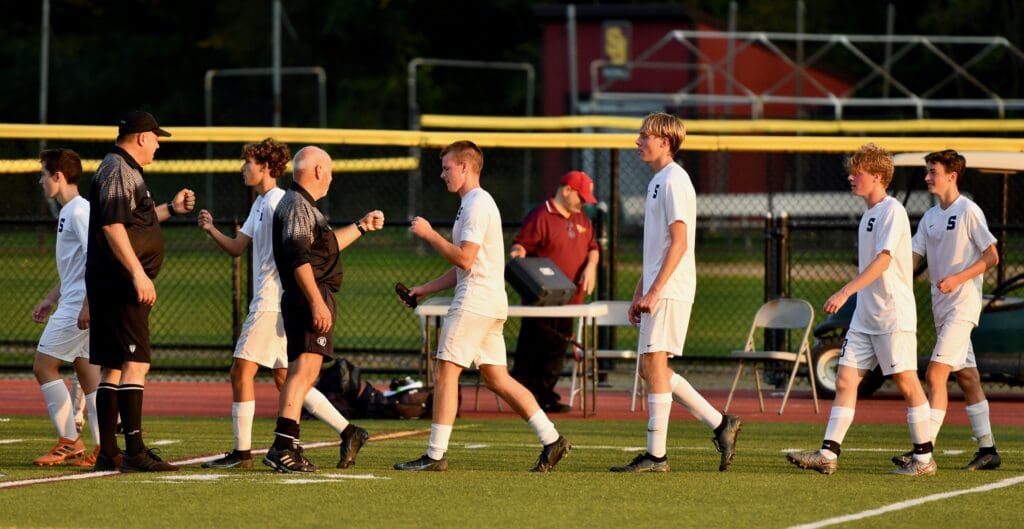 Post-game handshake -- Photo Mark Sikorski