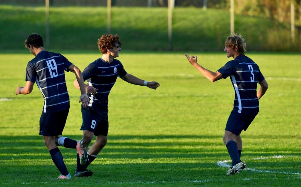 Reese Watkins celebrates against Trumbull - Photo Mark Sikorski