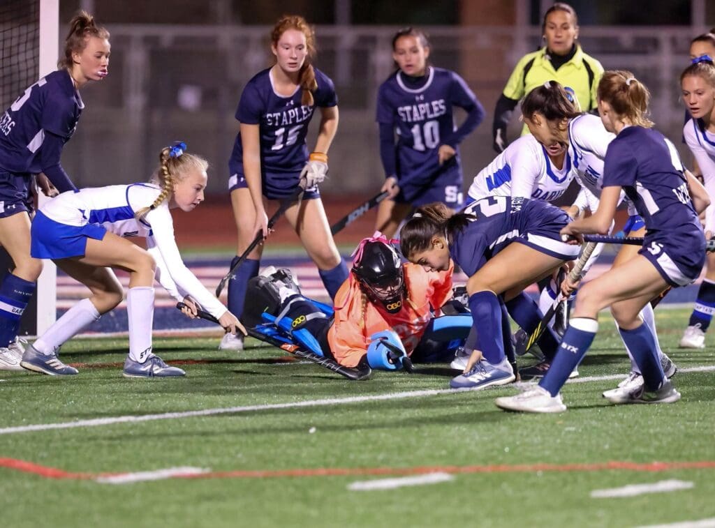 Goalkeeper Emma Williams smothers a shot from the Blue Wave -- Photo Shelley Burger
