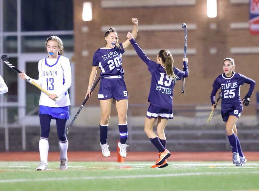 Jess Leon, Emma Larit and Sofia Fidalgo celebrate the Wreckers only goal -- Photo Shelley Burger