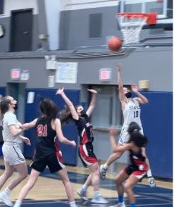 Staples Thwarts New Canaan, 36-31