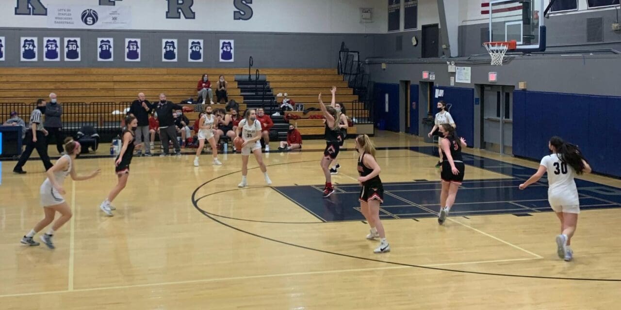 Staples Succumbs to Warde
