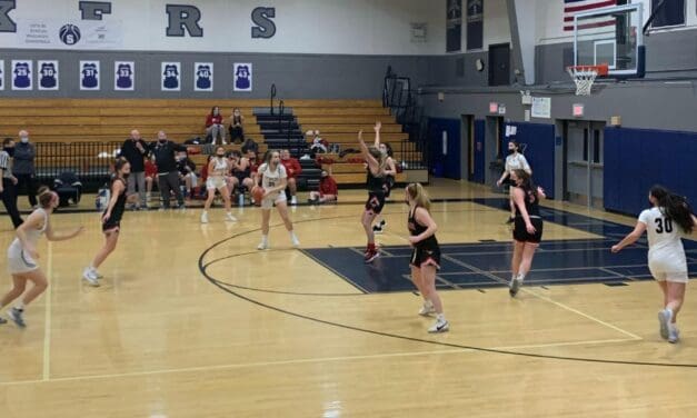 Staples Succumbs to Warde
