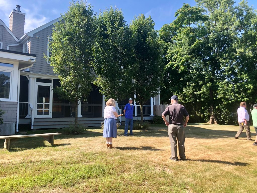 Conservation Commission members and staff had a site visit to 2 Owenoke Park on Friday morning. The house is to be torn down for a new structure. / Photo by Thane Grauel.