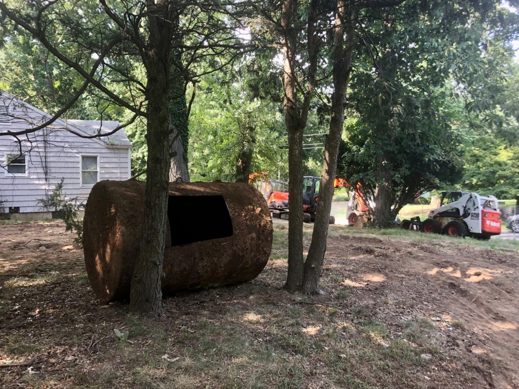 Septic tanks and oil tanks are being removed in the area of Hiawatha Lane Extension to be demolished. / Photo by Thane Grauel.