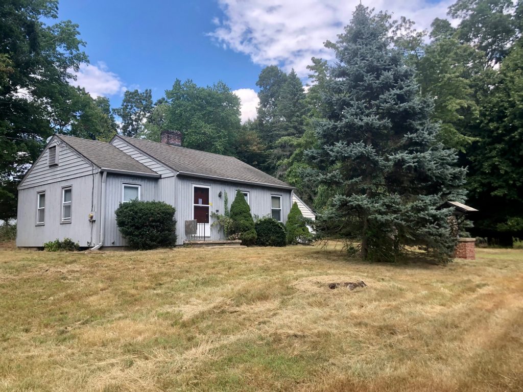 After many months, it appears the lawn at 28 Pin Oak Court had been cut. The house has been vacant since the owner died five years ago. / Photo by Thane Grauel.