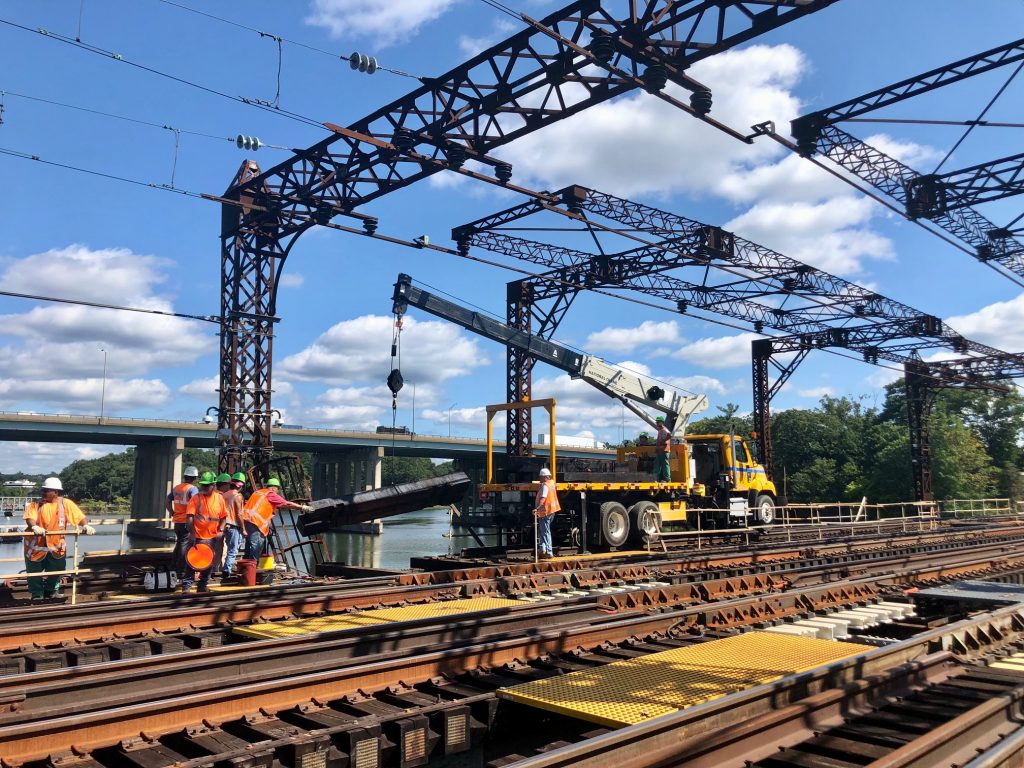 A Metro-North crew replacing sections of track on the Saugatuck railroad bridge on Wednesday. / Photo by Thane Grauel.