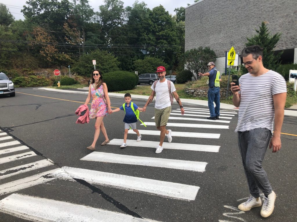 Crossing guard Rich Space begins his 11th year at his post near King's Highway Elementary, shepherding students across Burr Road. / Photo by Thane Grauel.