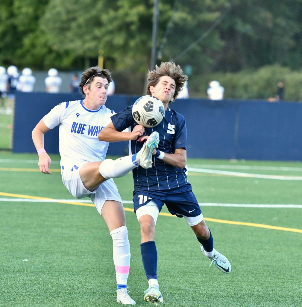 Avery Mueller takes it on the chin–Photo Mark Sikorski
