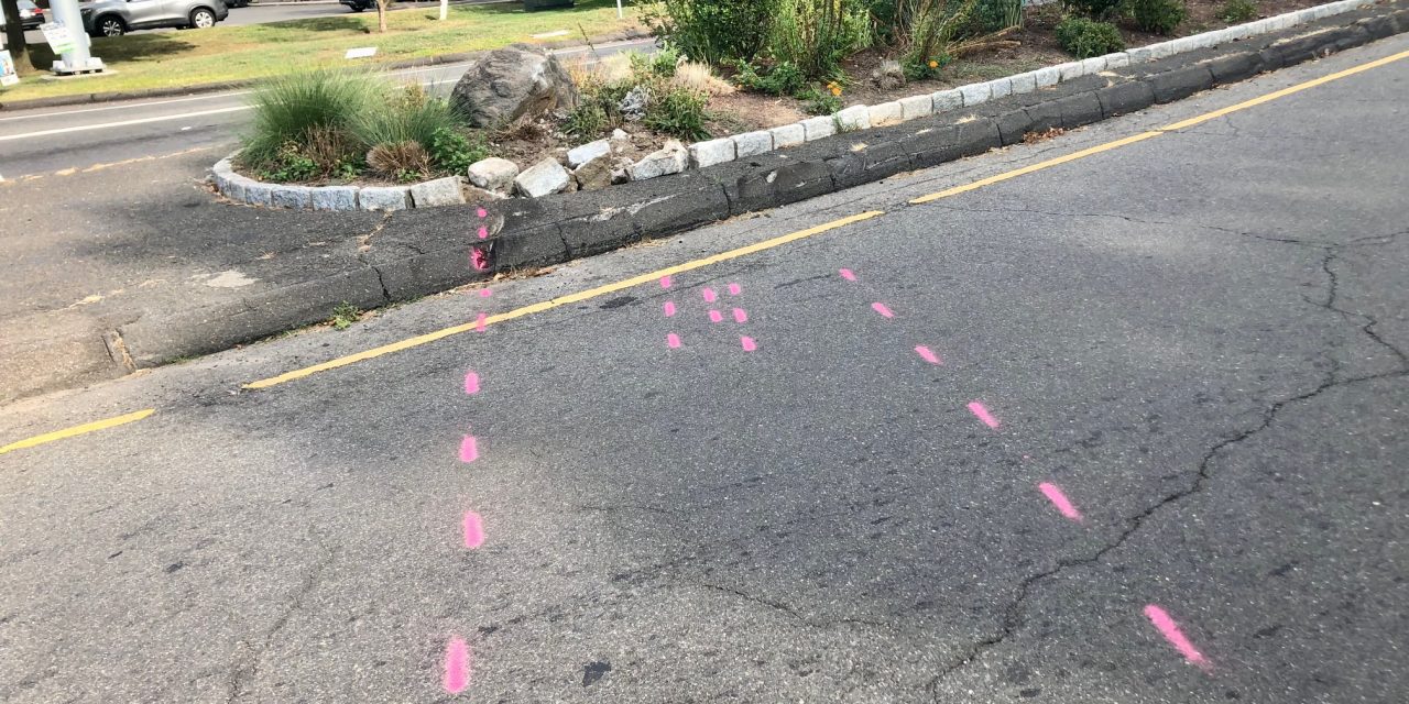 Connector rollover: Car appears to have veered off Post Road,  struck median