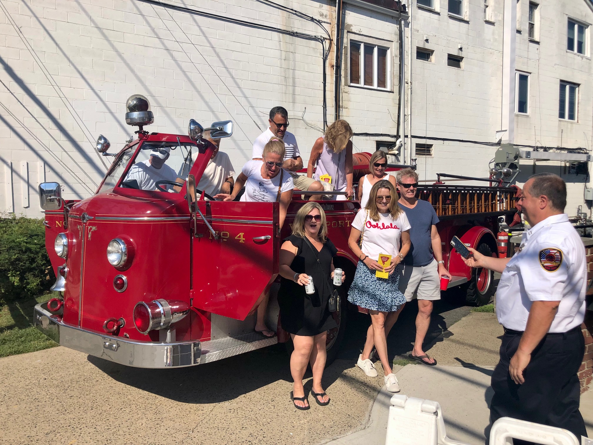 Children of all ages climbed aboard Westport's 1953 American LaFrance fire engine. / Photo by Thane Grauel.