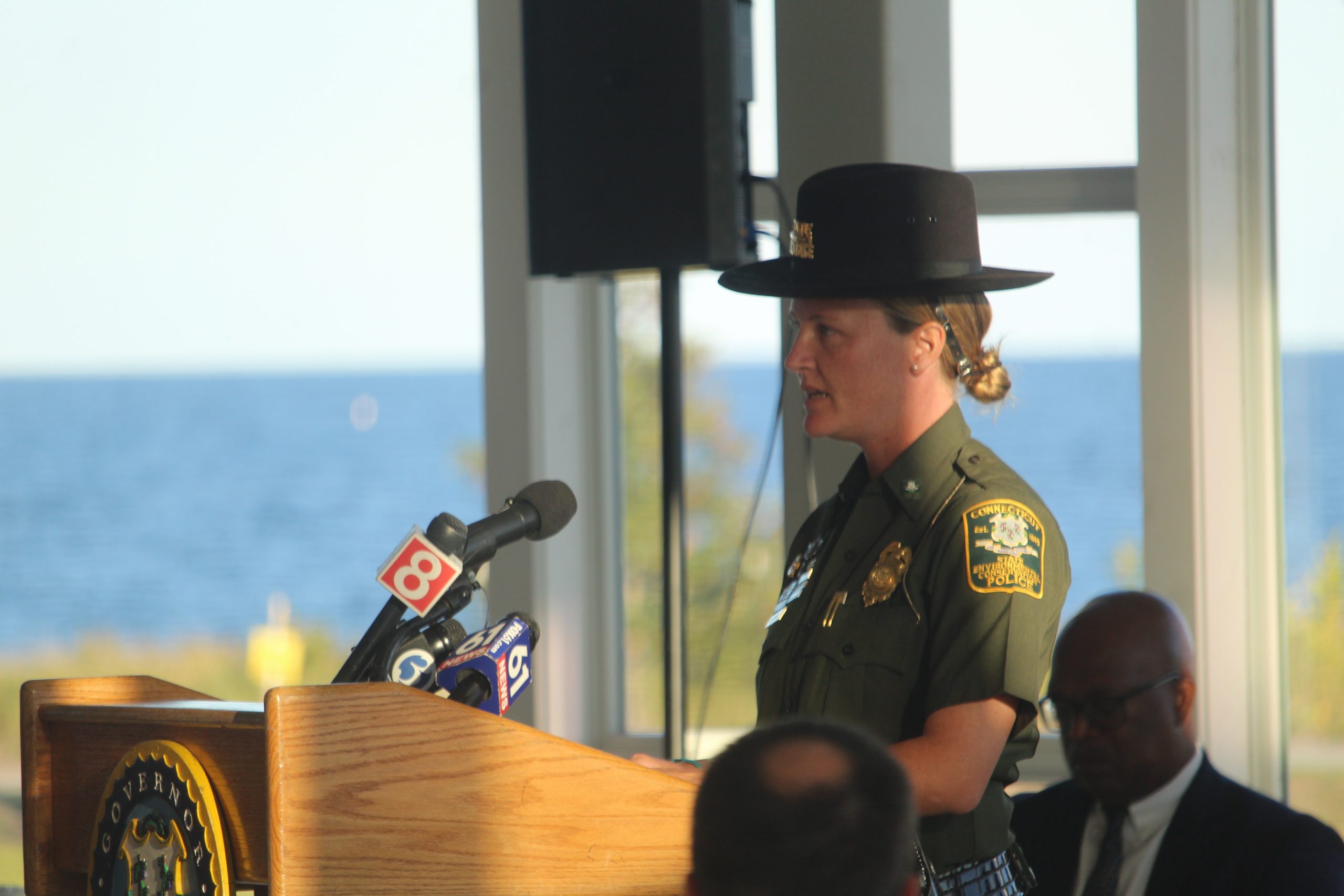 Connecticut State Environmental Police Officer Alexandra Blackwell speaks at the Sept. 11 remembrance ceremony on Thursday. Her father, Christopher J. Blackwell, died in the terror attacks. / Photo by Thane Grauel.
