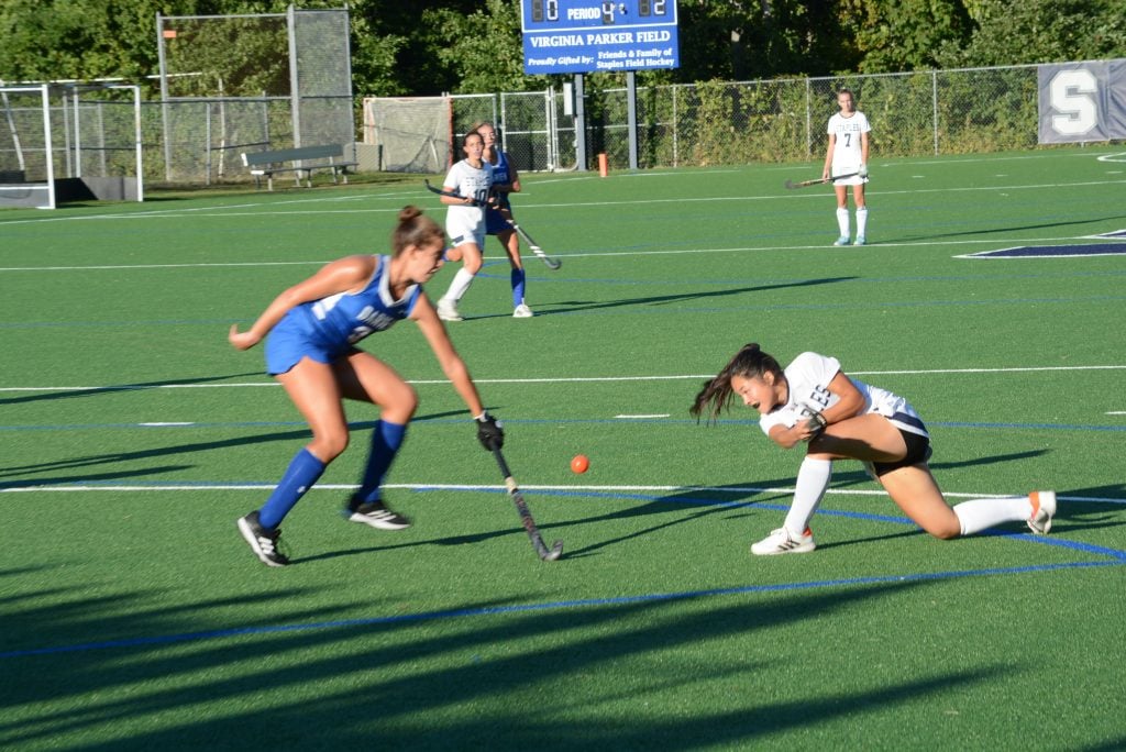 Tyla Ozgen takes a shot at the cage during Staples' home game against Darien–Photo Andy Hutchison