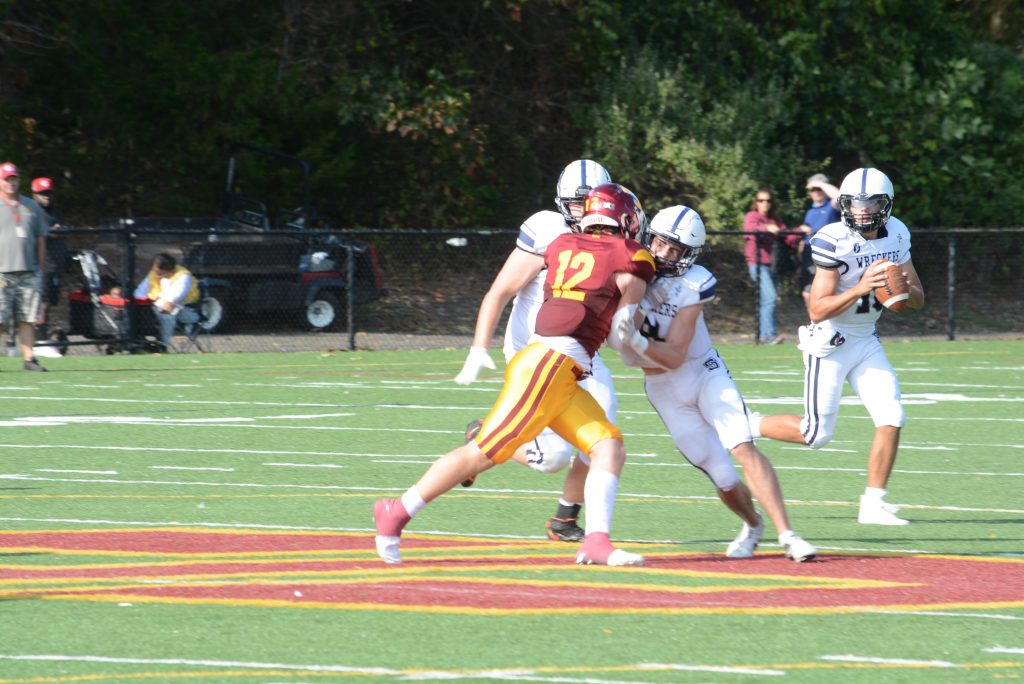 Quarterback Caleb Smith competes during a game this fall. Smith helped the Wreckers to a 42-21 win over Danbury on Friday–Andy Hutchison photo