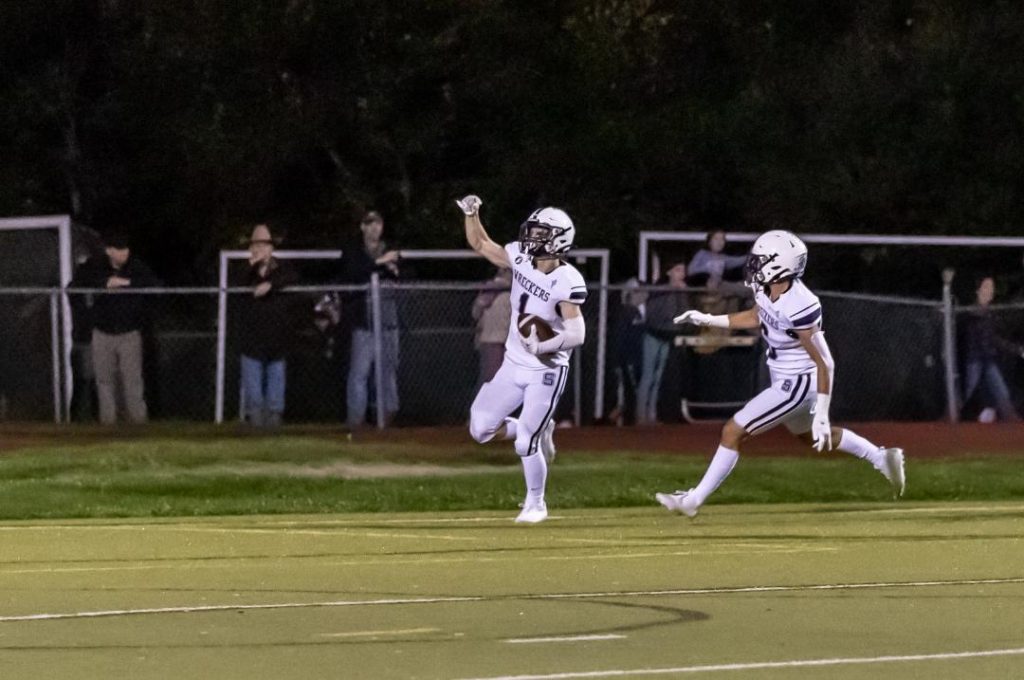 Tyler Clark, left, and James Hillhouse celebrates one of Clark's two touchdowns–Photo Chris Greer
