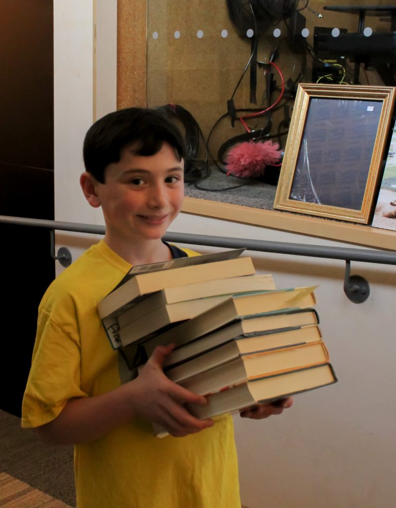 Westport Library fall book sale volunteer Dylan Rosen. / Photo by Corrina Palarino