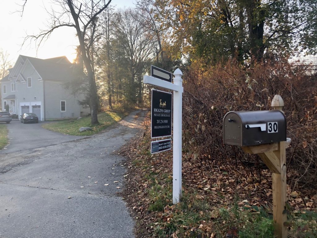 The driveway to 30 Maple Lane (to the right), where 30 or more units might be built under the state's 8-30g affordable housing legislation. / Photo by Thane Grauel