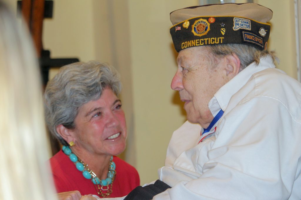 First Selectwoman Jennifer Tooker talks with Bill Vornkahl, president of the Westport Veterans Council. / Photo by Thane Grauel