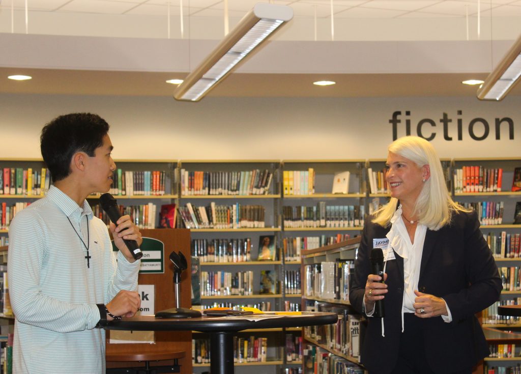 Jayme Stevenson, Republican candidate for the Fourth Congressional District, talks with Staples senior Spencer Yim. / Photo by Thane Grauel