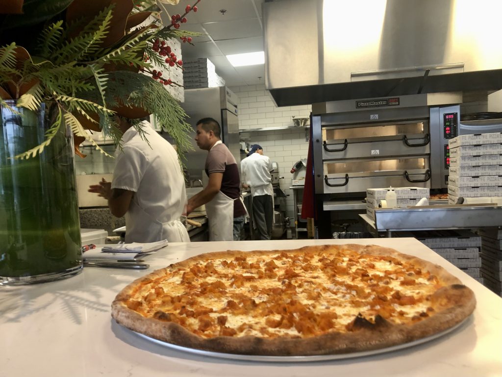 Pizza Lyfe serves New York-style pies. It opened quietly Monday. / Photo by Thane Grauel