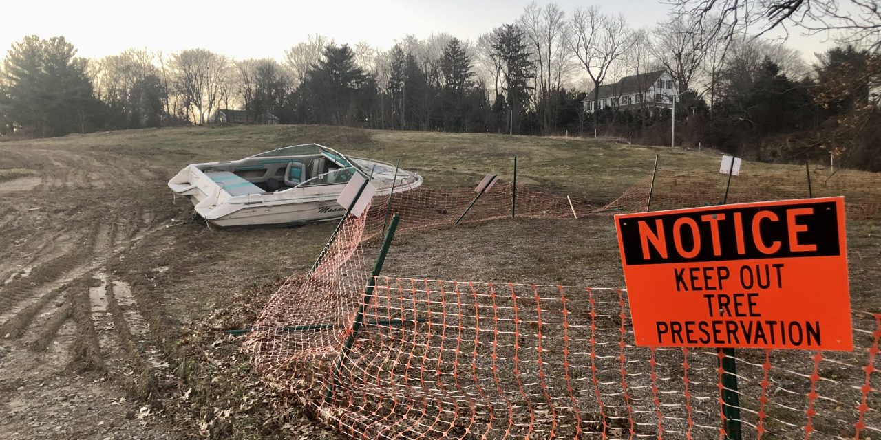 Marooned motorboat hauled away: State Police seek owner