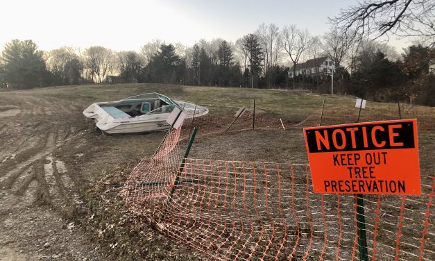 Marooned motorboat hauled away: State Police seek owner
