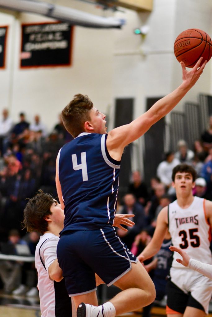Cody Sale puts up a shot during the Wreckers' win at Ridgefield on Friday - Photo Mark Sikorski