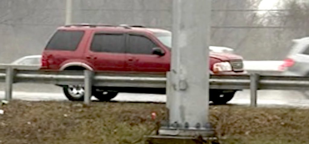 The red Ford Explorer owned by Errol Whyte, of Stamford, who has been reported missing since the vehicle was found Dec. 30 on the side of southbound Interstate 95 between exits 18 and 17 in Westport. / Screenshot, News 12