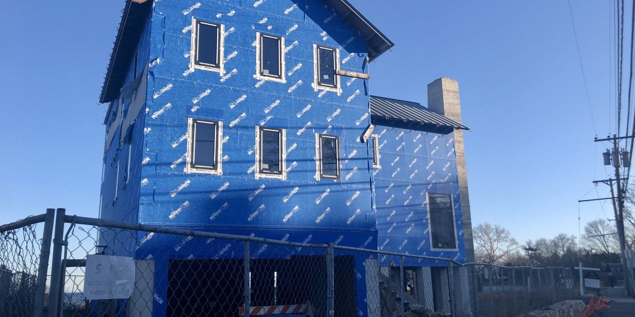Town’s patience wears thin on blue-wrapped Old Mill eyesore