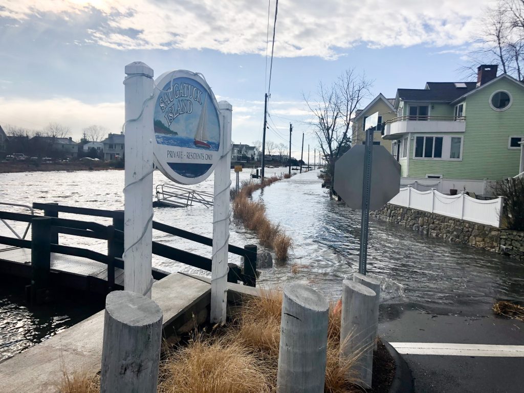 Canal Road frequently floods during astronomical high tides and storm surges. / Photo by Thane Grauel