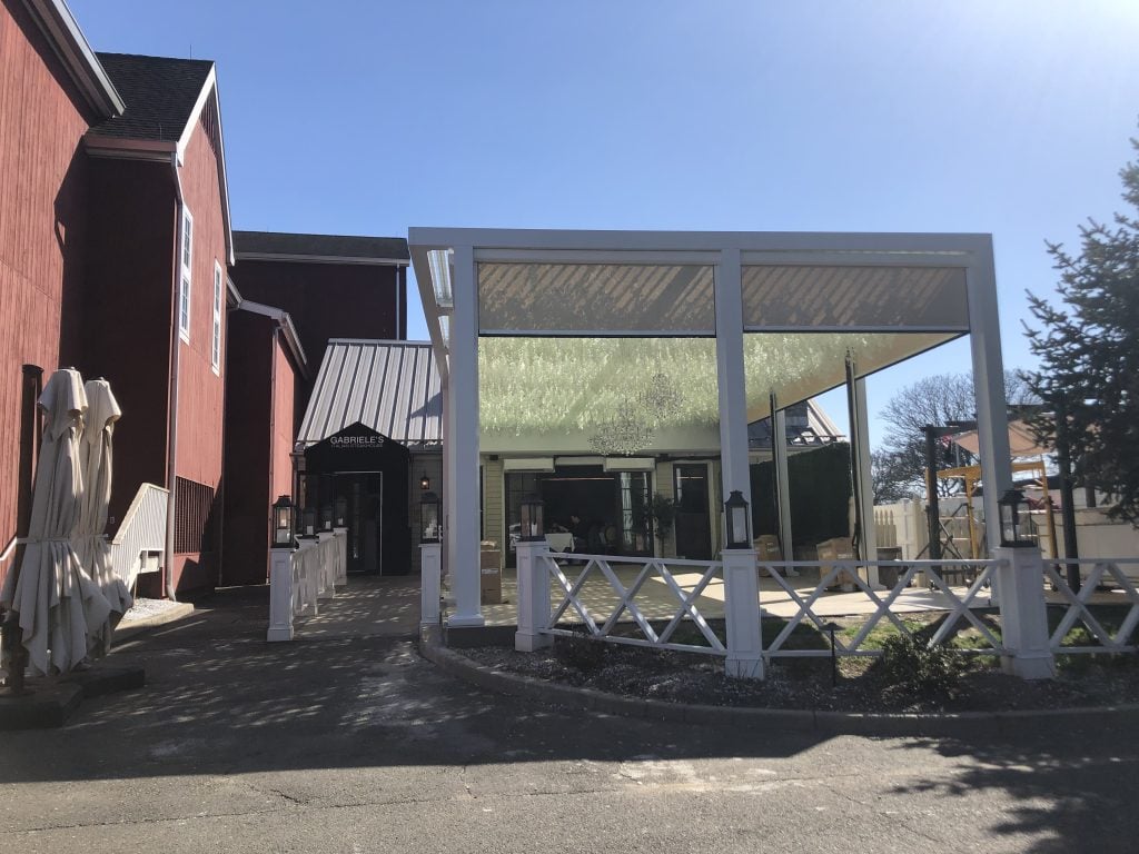 The oversized pergola at Gabriele's of Westport, with its retractable side up.