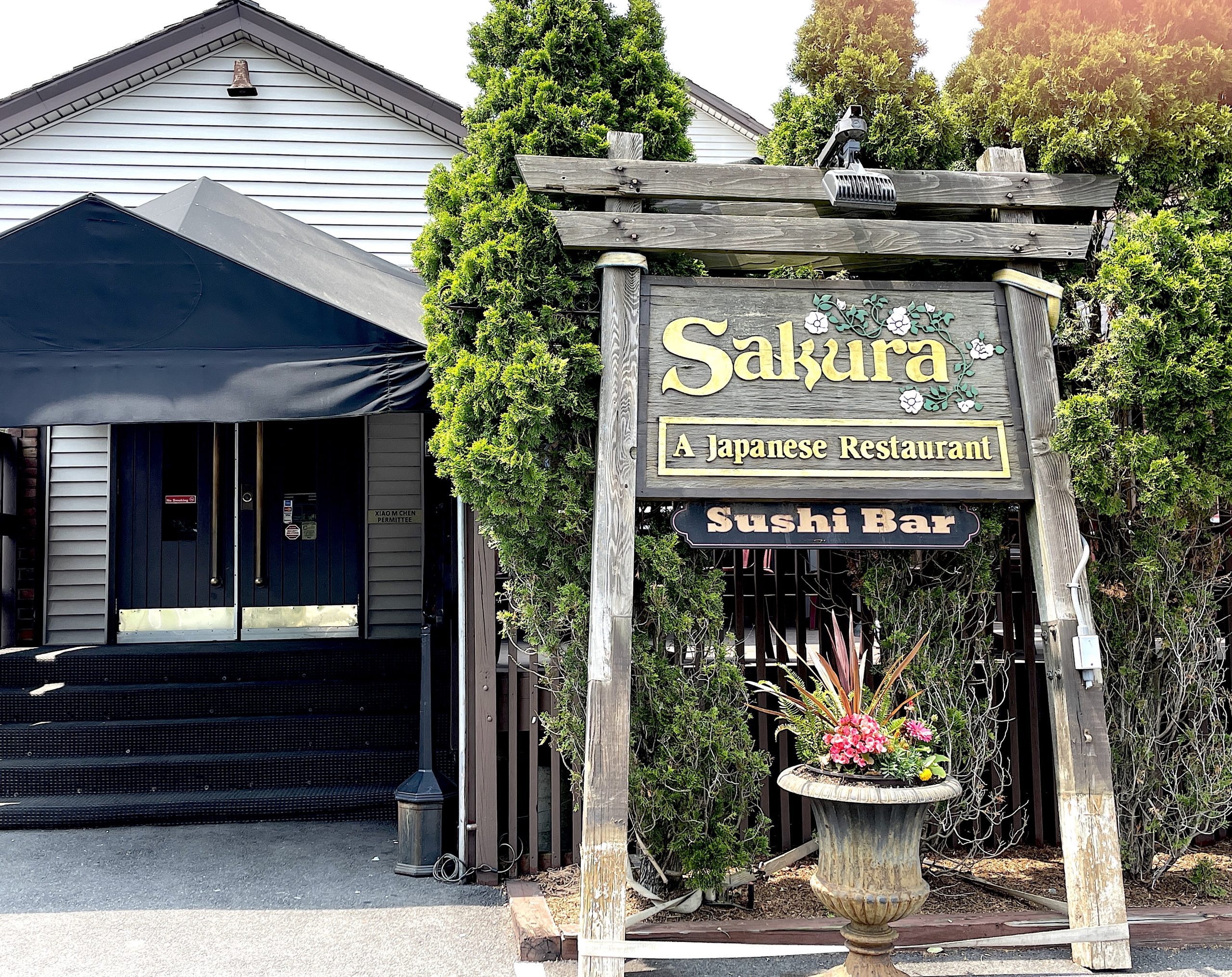 This sign for Sakura restaurant has stood next to the eatery at 680 Post Road East for more than four decades, but has to be moved since the state Department of Transportation has claimed the sign’s original location for a road improvement project.