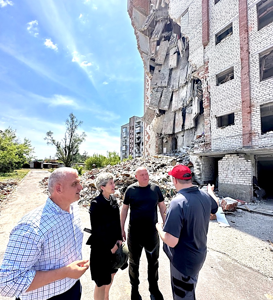 First Selectwoman Jennifer Tooker and Police Chief Foti Koskinas survey damage caused by Russian bombing in their tour of the Donetsk Oblast region of Ukraine on Sunday.