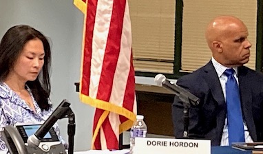 School board splits in approving plan to add student seats