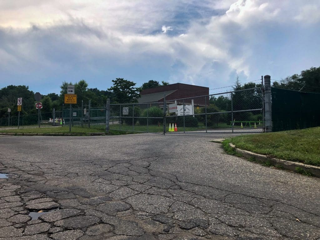"Alligator cracked" pavement at the Department of Public Works site. / Photo by Thane Grauel