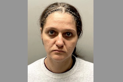 Police: Woman cashed check stolen from victim’s car