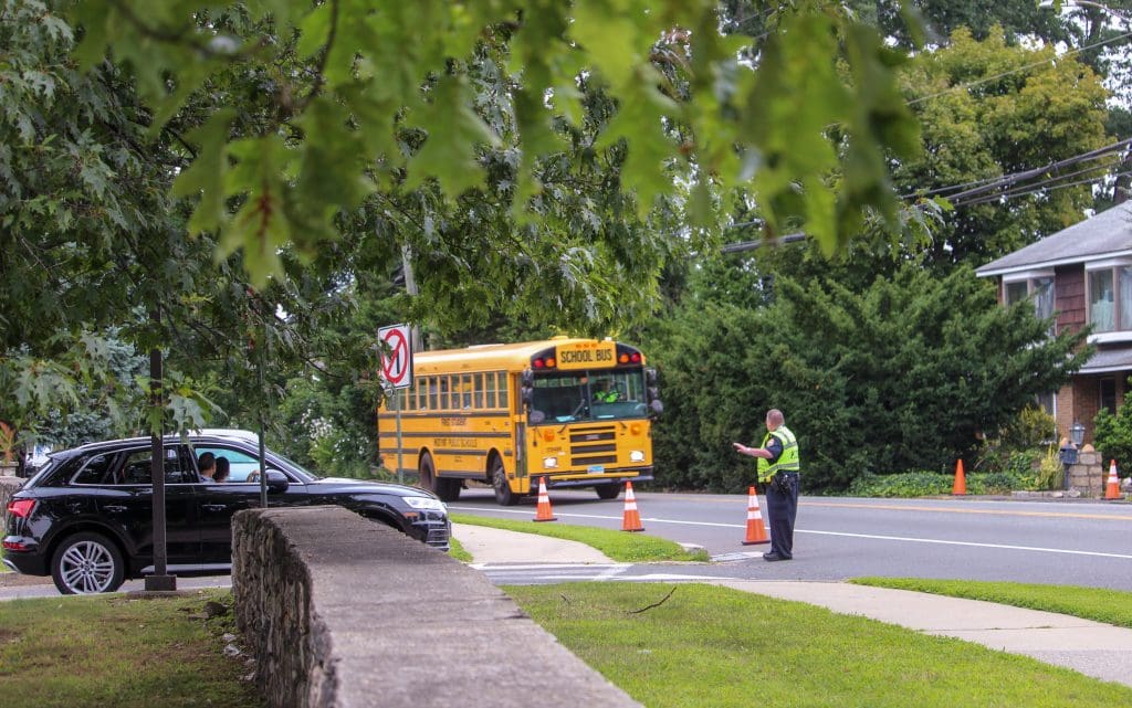 Directing traffic on Riverside Avenue.