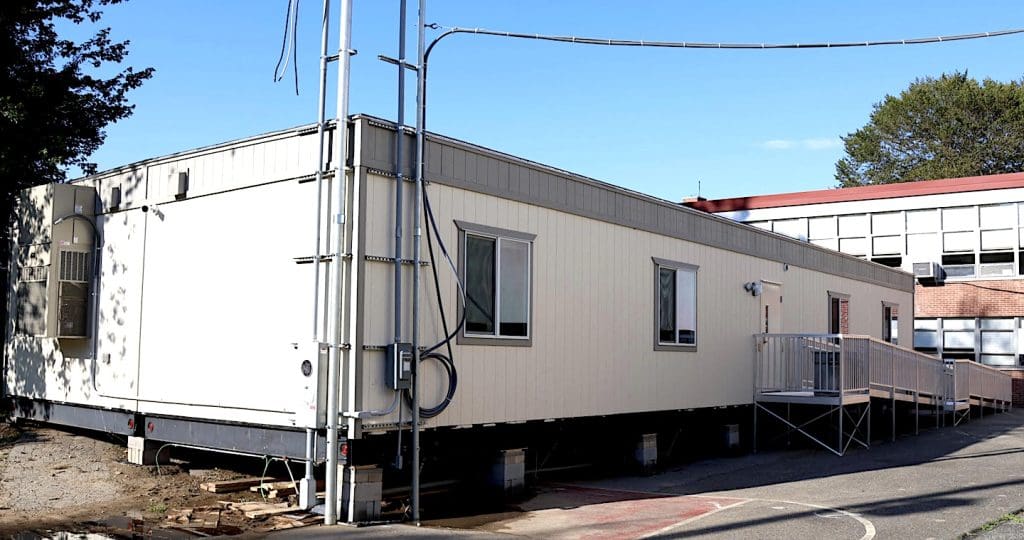 Long Lots Elementary School modular classroom / standing image