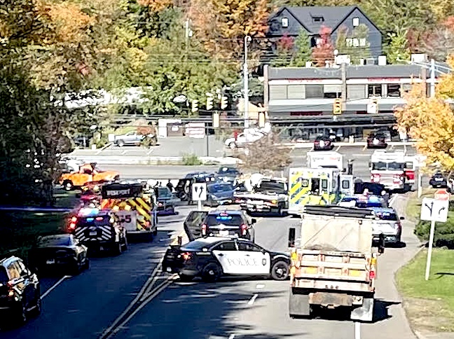 The scene on Sherwood Avenue Connector, near Post Road East, where a car crashed Monday with suspects involved in motor vehicle thefts and attempted break-ins, police said.