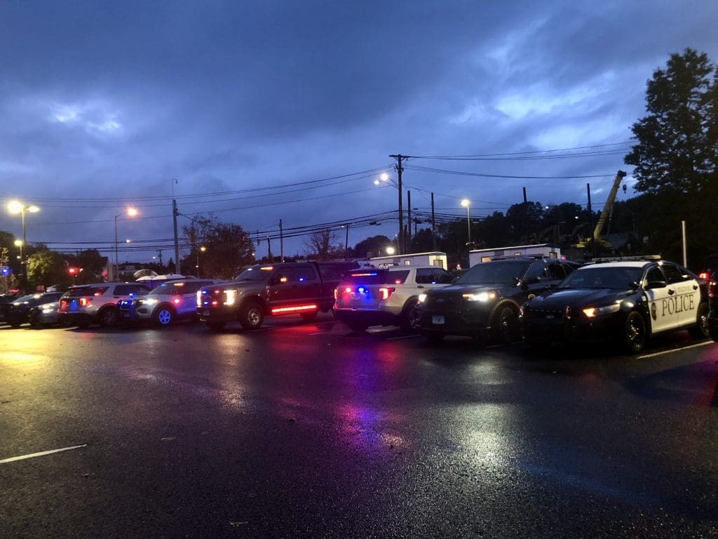 Police vehicles getting ready to close down and shift lanes on I-95. / Photo by Thane Grauel