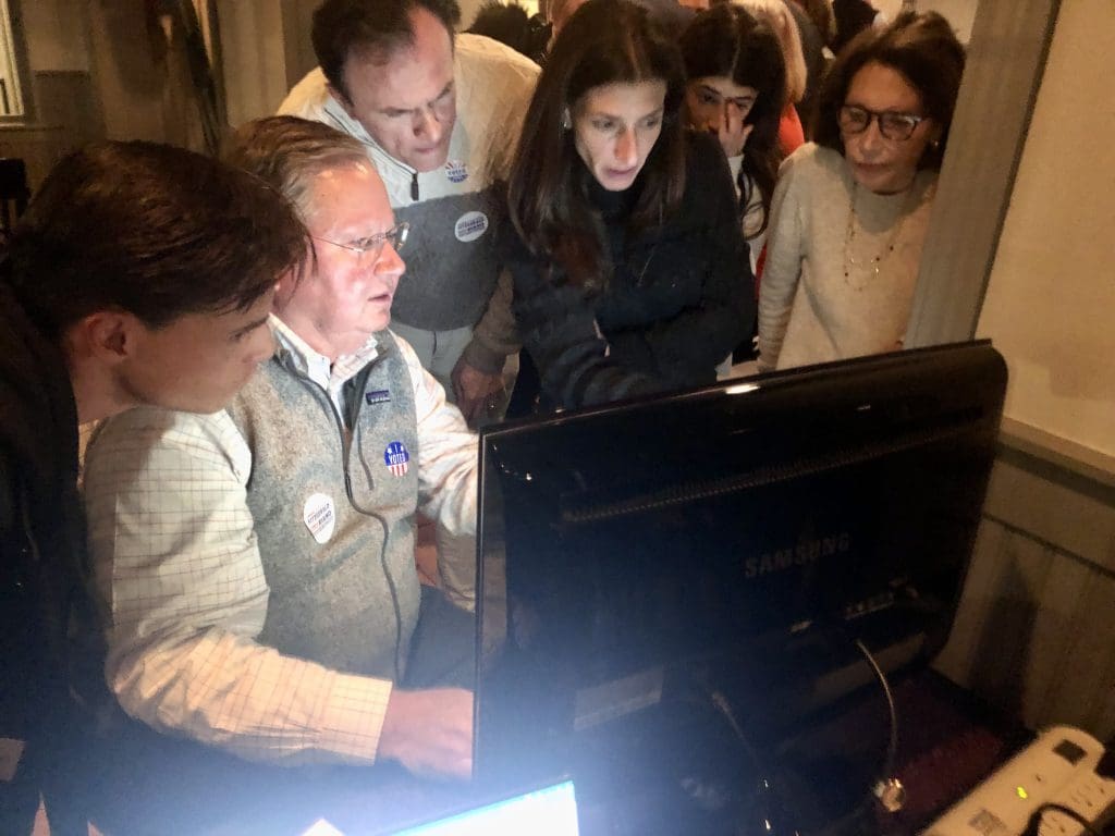 Republicans watch unofficial numbers trickle in at Rizzuto's on Tuesday.