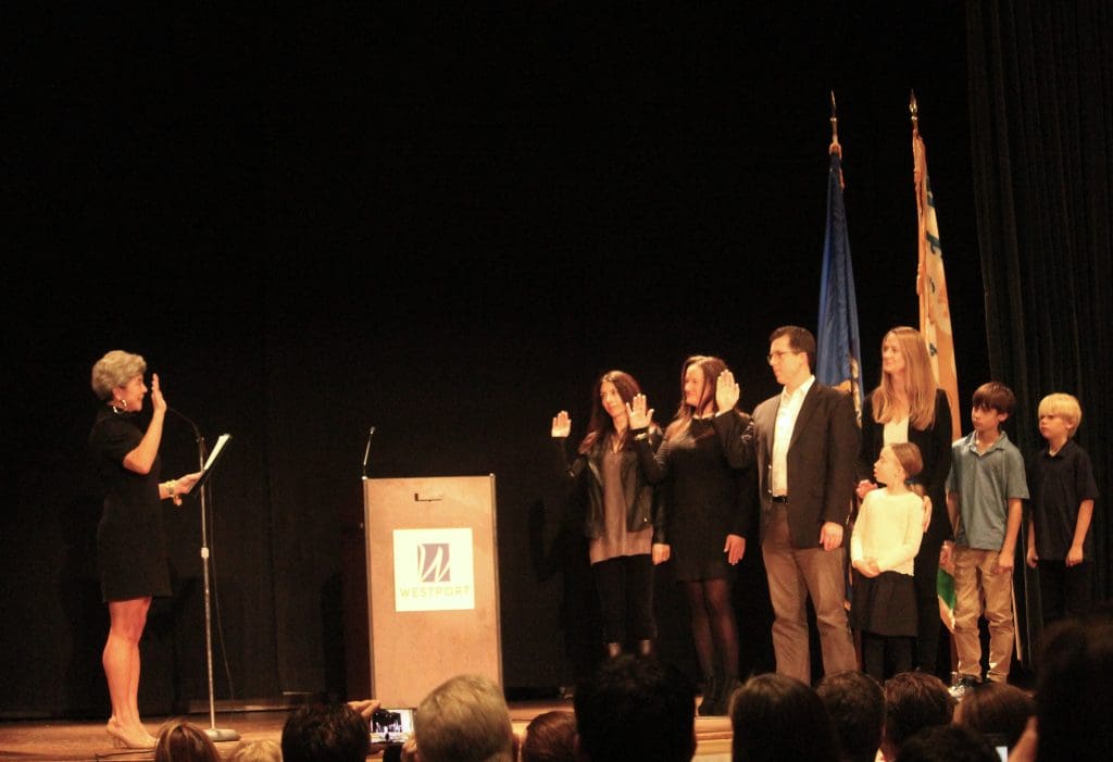 First Selectwoman Jennifer Tooker swears in newly elected Board of Finance members Liz Heyer, Danielle Dobin and Rich Hightower.