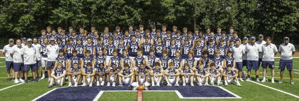 The Staples varsity football team.