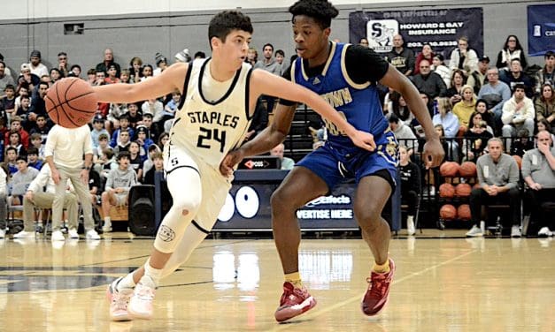 Staples boys basketball wins season opener, 73-57