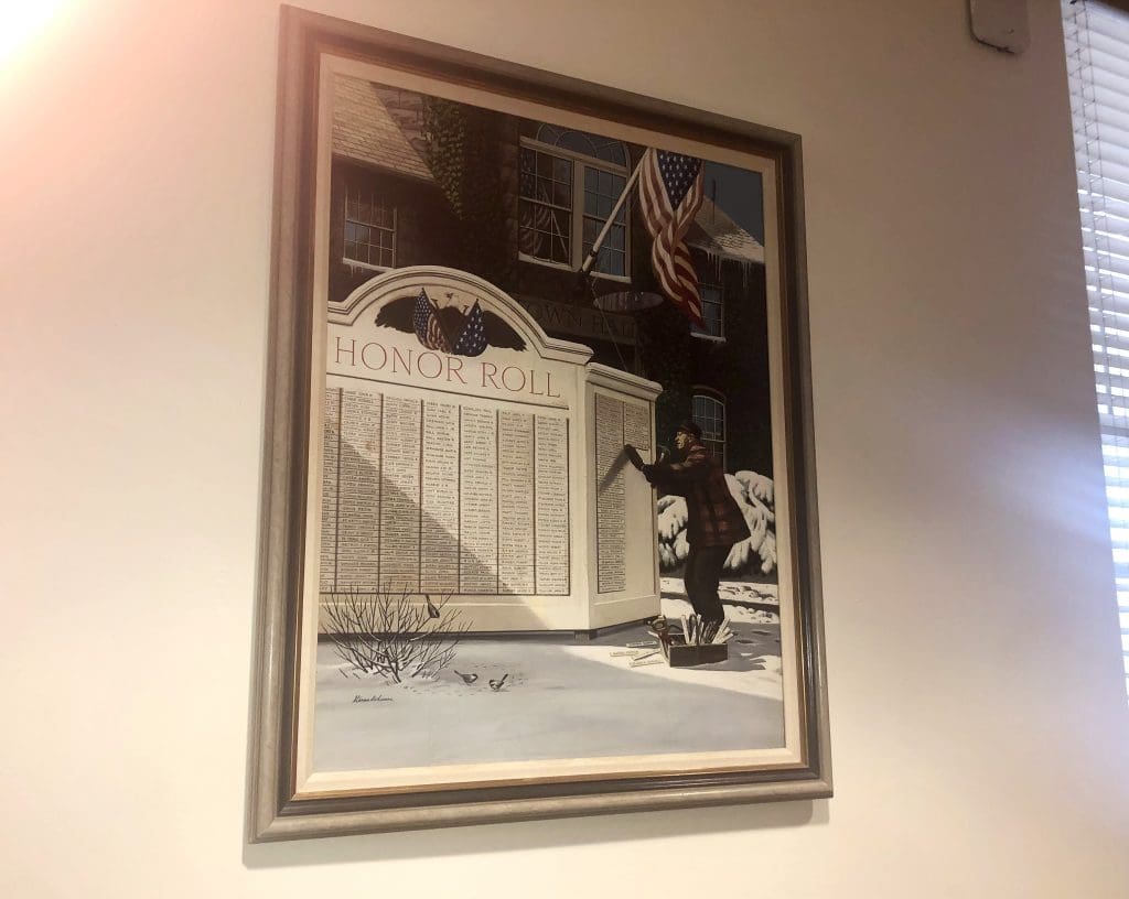 "Honor Roll" hanging in a Town Hall meeting room. / Photo by Thane Grauel