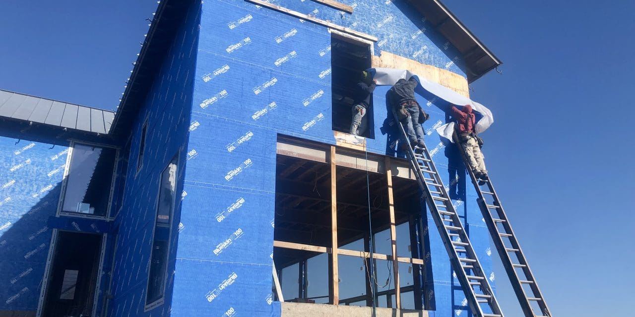 New owners of blue-wrapped house seek architectural tweaks