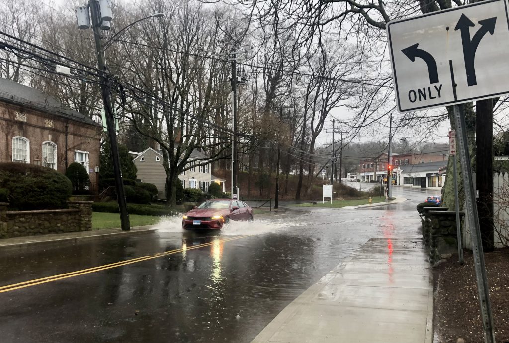 Deadman Brook floods Myrtle Avenue.